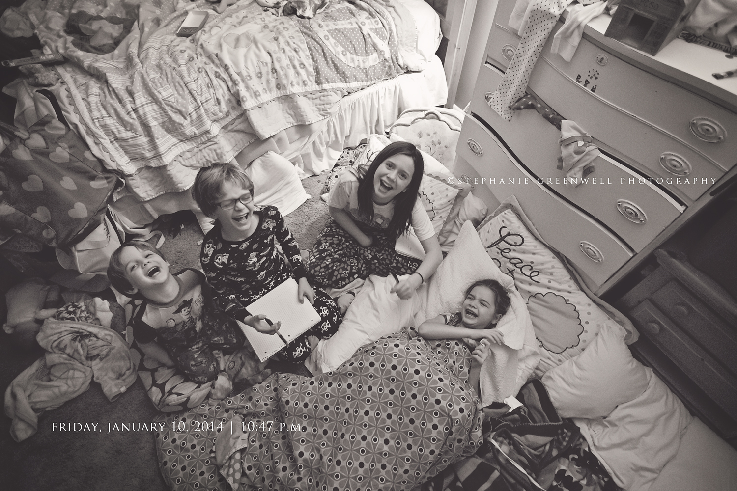 photo a day family lifestyle kids laughing bedroom sleeping bag southeast missouri photographer stephanie greenwell